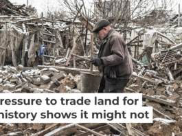 An elderly Ukrainian walks through the rubble following a Russian aerial bomb strike in Donetsk Oblast. Diego Herrera Carcedo/Anadolu via Getty Images
